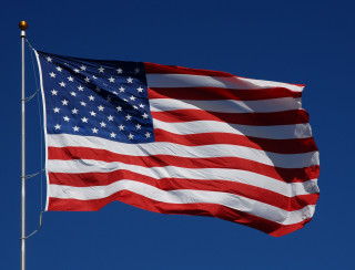 American flag waving blue sky - a clear day free wallpaper