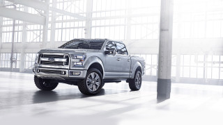 Silver truck large building sky 2 - a large window behind free wallpaper