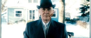 Man suit hat snow house - edward simmons free wallpaper