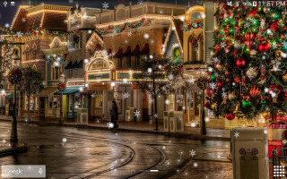 Christmas tree lit building corner - magical atmosphere free wallpaper