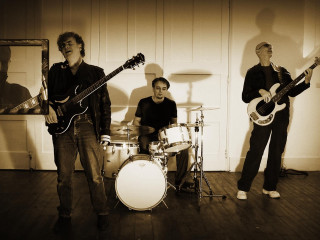 Men playing guitars drums room - david boyd free wallpaper