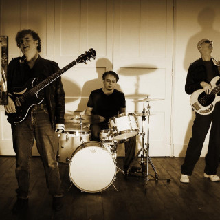 Men drum set guitar player - a group of men free wallpaper for tablet