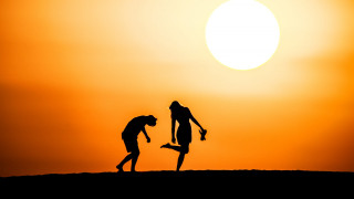 Couple people dirt sunset sky - a kite free wallpaper for desktop