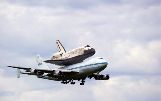 Jetliner space shuttle carrying large - science fiction free wallpaper