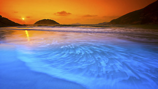 Sunset beach waves mountains orange - orange sky free wallpaper