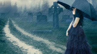 Woman long dress umbrella rain - a cemetery in the background free wallpaper