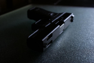 Black gun table black background - 30mm free wallpaper