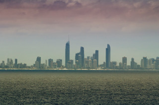 City skyline water cloudy sky 3 - a cloudy sky in the background free wallpaper