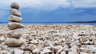 Beach rocks ocean sky clouds - a pile of rocks free wallpaper