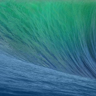 Large wave breaking surfboarder ocean - a blue sky free wallpaper for tablet