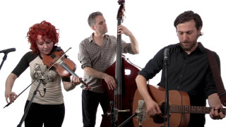 Group playing instruments singing microphones - deep shadow free wallpaper