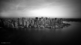 Black white city skyline water - a large city in the background free wallpaper