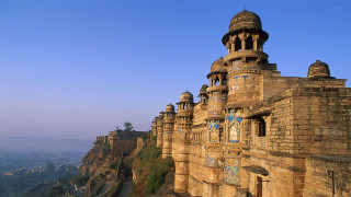 Castle clock cliff valley structure 2 - a cliff side free wallpaper