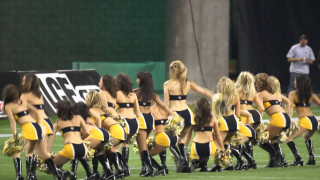 Cheerleaders performing field game man - a game free wallpaper