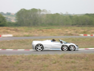 Silver sports car race track 9 - motion blur free wallpaper