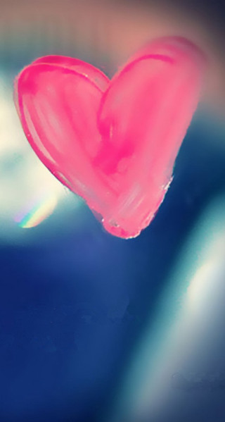 Heart shaped floating blurry background - a blurry background behind free wallpaper for mobile