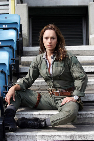 Woman uniform sitting steps legs - transgressive art free wallpaper for mobile