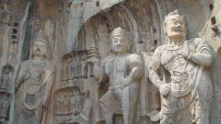 Statues group men women stone - a stone wall free wallpaper