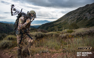 Man bow arrows field mountains - ada hill walker free wallpaper