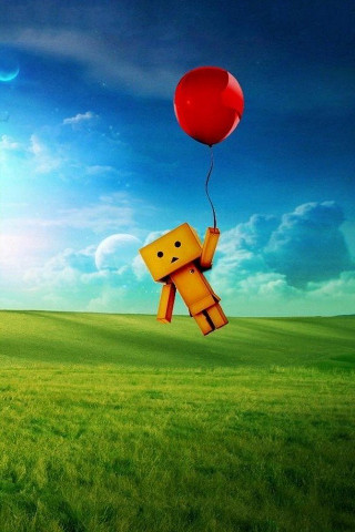 Red balloon floating grass yellow - a face free wallpaper for mobile