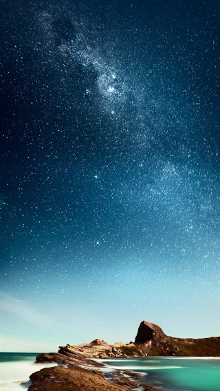 Night sky stars water rock - free sky wallpaper for mobile