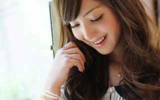 Woman long hair bracelet smiling - chizuko yoshida free wallpaper