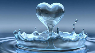Heart shaped object floating water 2 - a drop of water free wallpaper
