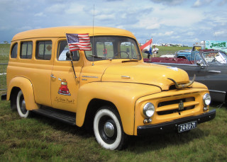 Yellow truck parked field cars - artgem free wallpaper