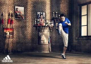 Man kicking soccer brick wall - action free wallpaper for desktop