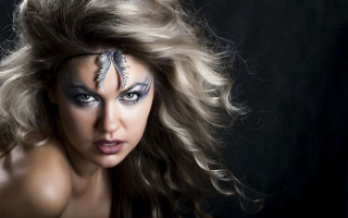 Woman feather painted hair wind - her face and hair free wallpaper