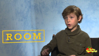 Young boy chair blue wall - a young boy free wallpaper