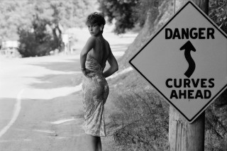 Woman danger curves ahead road - ahead free wallpaper