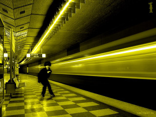Man walking subway platform train - a train free wallpaper