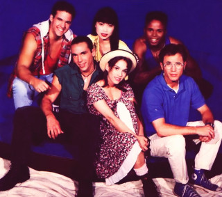 Group posing bed blue background - a blue wall free wallpaper for tablet