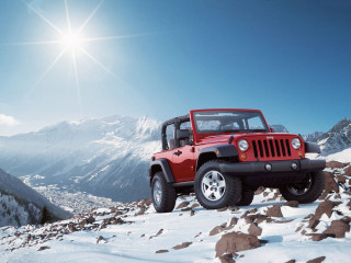 Red jeep snowy mountain sunshine - a snowy mountain free wallpaper