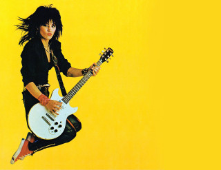 Woman jumping guitar yellow background - eric taylor free wallpaper for desktop
