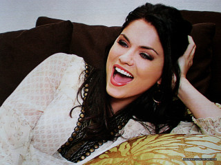 Woman couch smiling hands head - cheerful free wallpaper