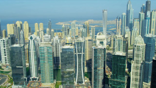 City tall buildings water background - aerial free wallpaper