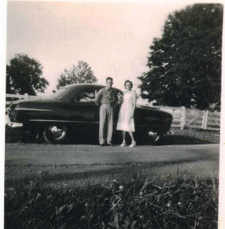 Man woman car field grass - free vintage wallpaper for tablet