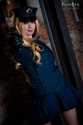 Woman uniform gun pose brick - cosplay free wallpaper for mobile