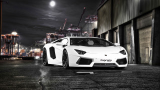 White sports car night cityscape 4 - a city skyline in the background free wallpaper for desktop