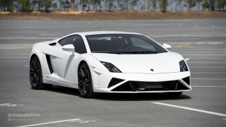 White sports car parking lot 38 - a white sports car free wallpaper