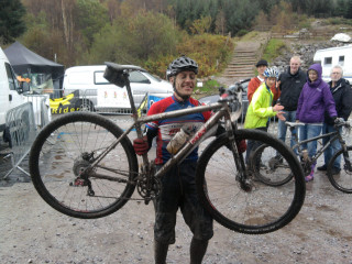 Man bike shoulders muddy area - muddy free wallpaper