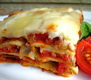 Lasagna plate tomato spinach leaf - food photography free wallpaper for tablet