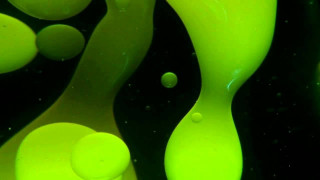 Green liquid flowing black surface - technique free wallpaper