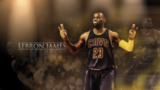 Man black jersey holding basketball - two hand free wallpaper