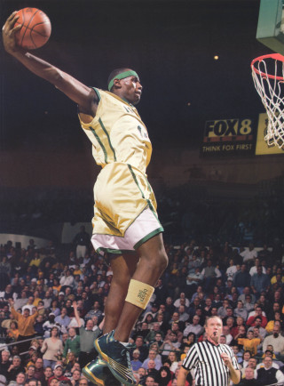 Man yellow uniform dunking basketball - the stand free wallpaper for mobile