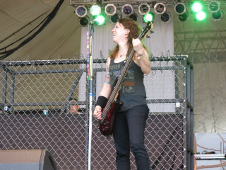 Woman stage guitar microphone performance - eric peterson free wallpaper