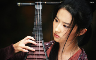 Woman holding guitar string neck - a string free wallpaper