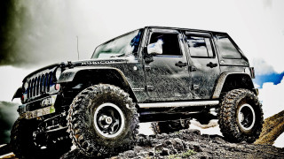 Black jeep rocky hillside cloudy - a black tire free wallpaper